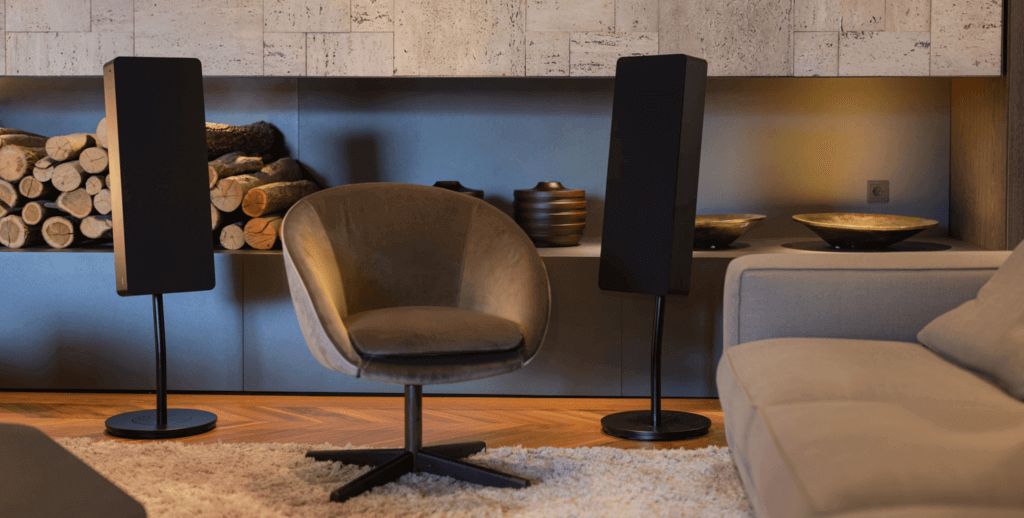 Braun Audio LE01 B stand in living room with chair